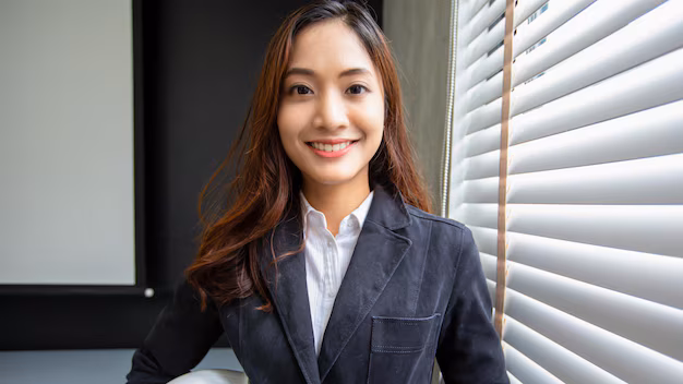 professional asian business woman standing confidently smiling office 33718 2308